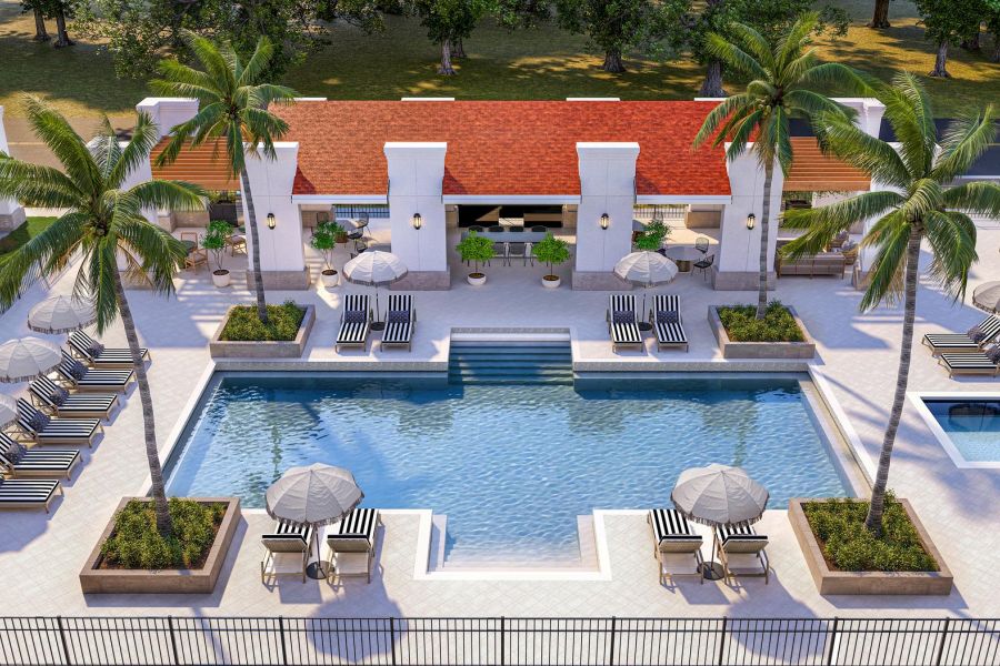 Resort-style swimming pool at The Karlyn luxury apartments in Naples, FL