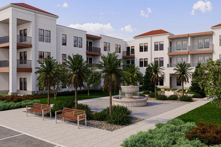 Modern apartment building with balconies, palm trees, benches, and a fountain in a landscaped courtyard.